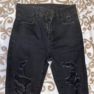 Black, size 0 ripped American eagle jeans